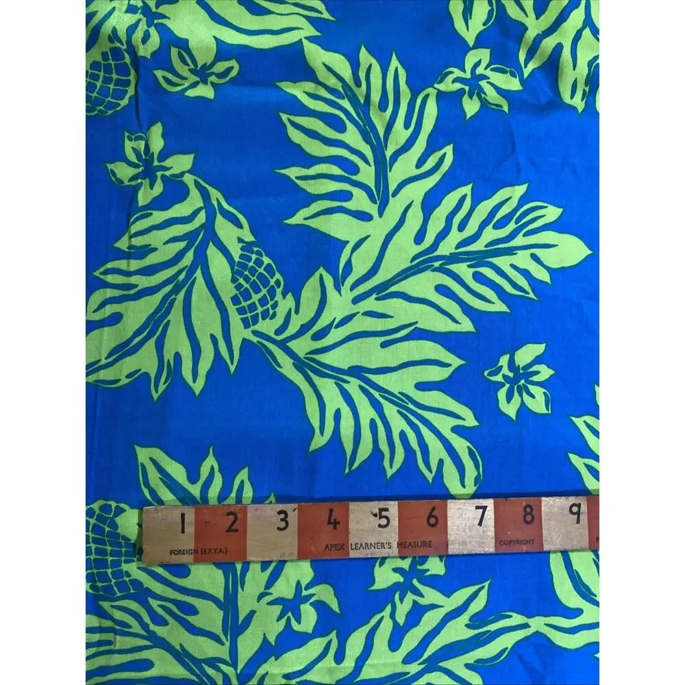 Hawaiian Fabric Lime Lauae Leaves on Cerulean Background Rayon 44